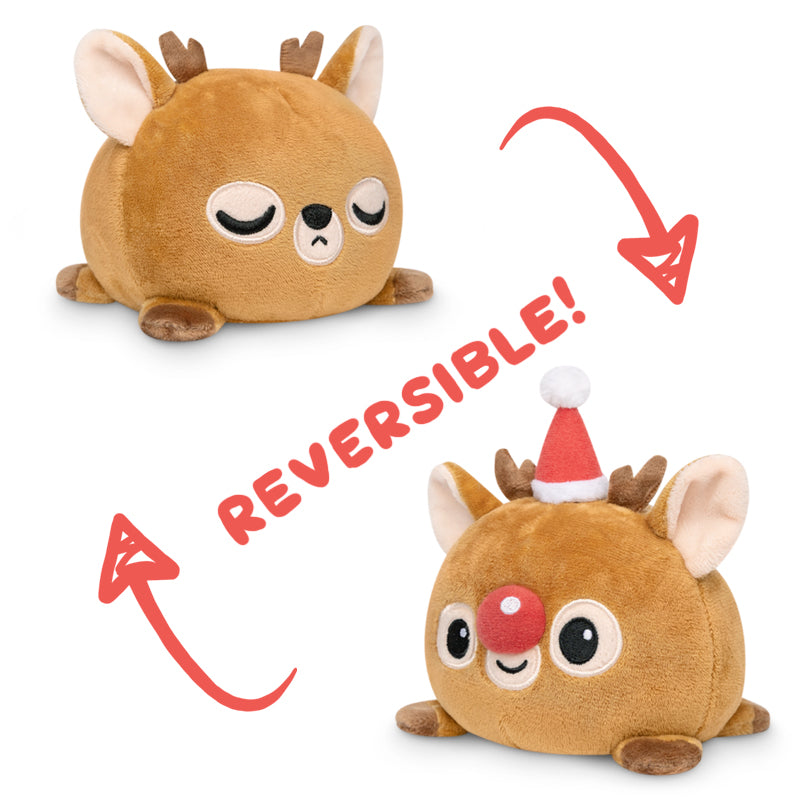 Rudolph the TeeTurtle Reversible Reinndeerr Plushie (Santa Hat) by TeeTurtle is a delightful mood plushie that will bring joy and smiles to all.