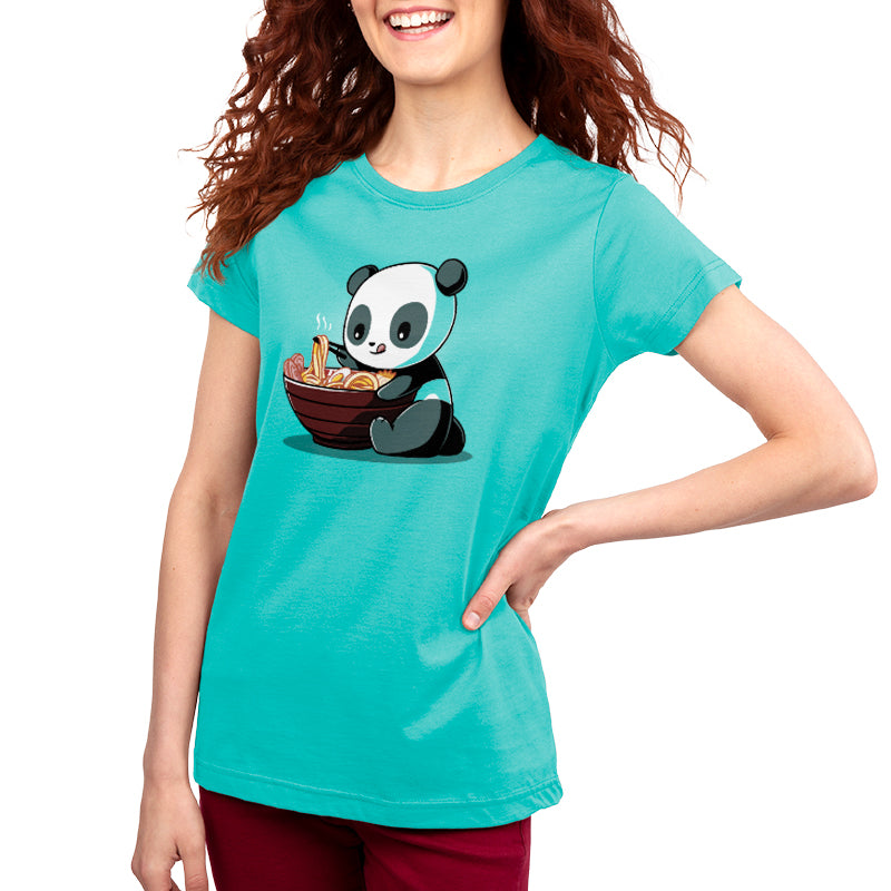 A woman with red hair smiles while wearing a Caribbean Blue T-shirt featuring a Ramen Panda cartoon; the super soft ringspun cotton adds to her delight. This delightful T-shirt is a product of monsterdigital's Ramen Panda collection.