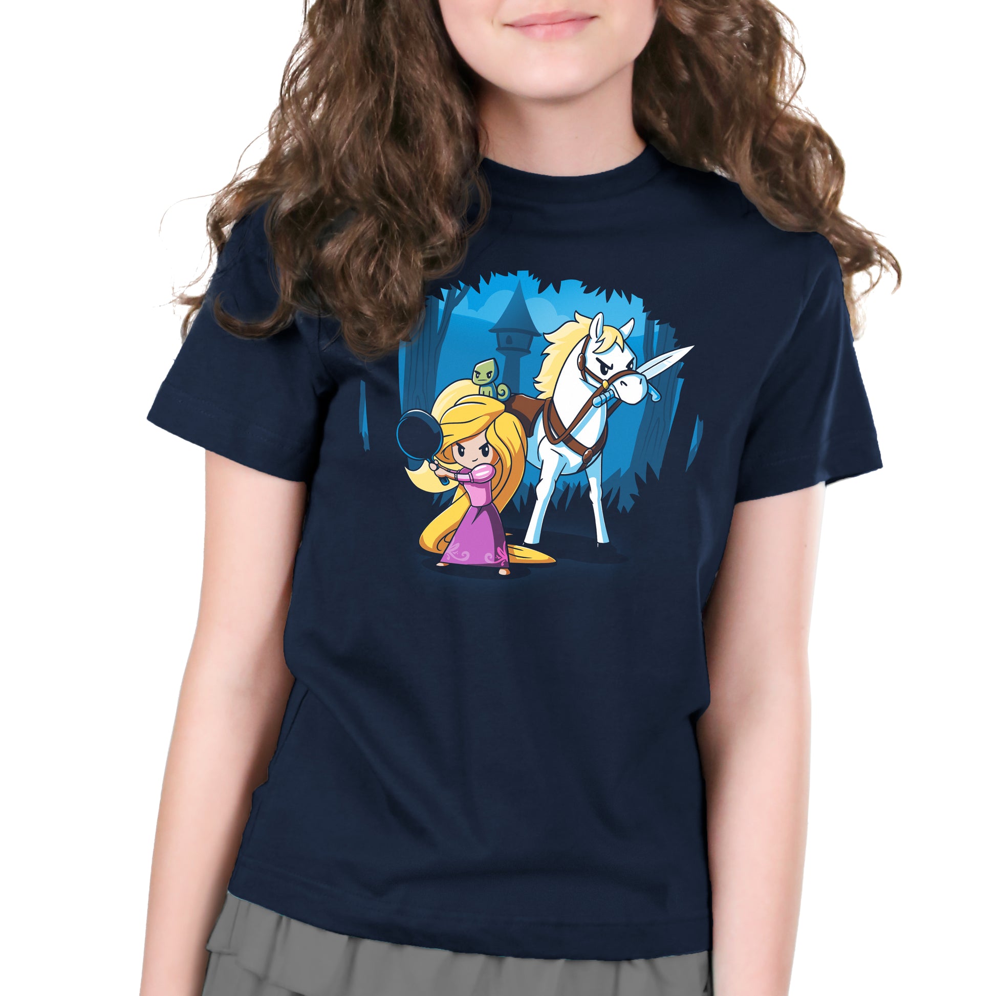 A young girl wearing an officially licensed Disney Rapunzel's Adventure t-shirt with an image of a princess and a unicorn.