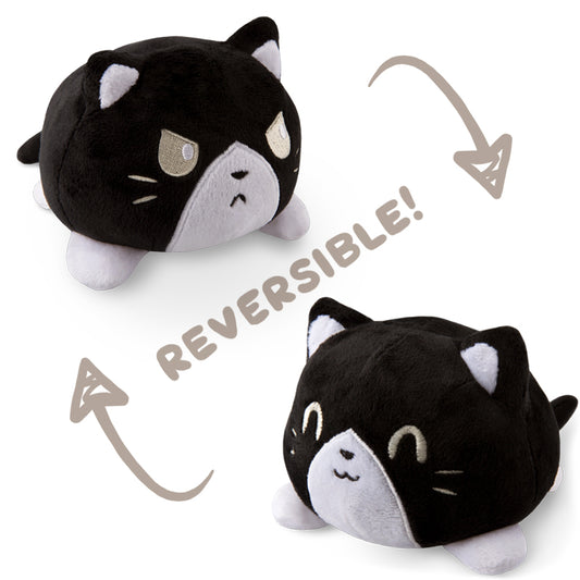 A TeeTurtle Reversible Cat Plushie (Tuxedo), the perfect mood plushie available in black and white, from TeeTurtle.