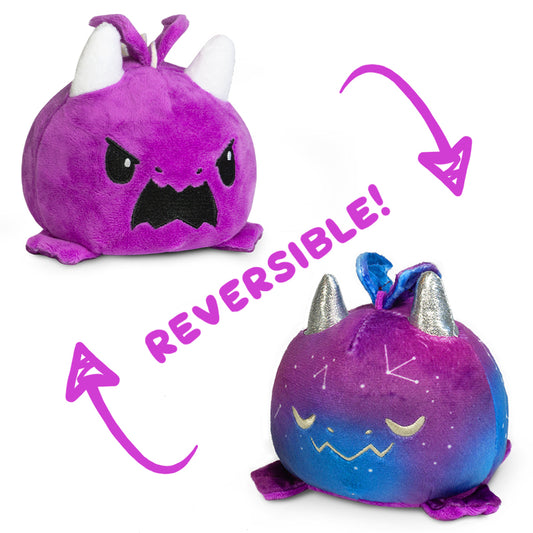 Two TeeTurtle reversible plush monsters, including a TeeTurtle Reversible Dragon Plushie (Purple + Galaxy).