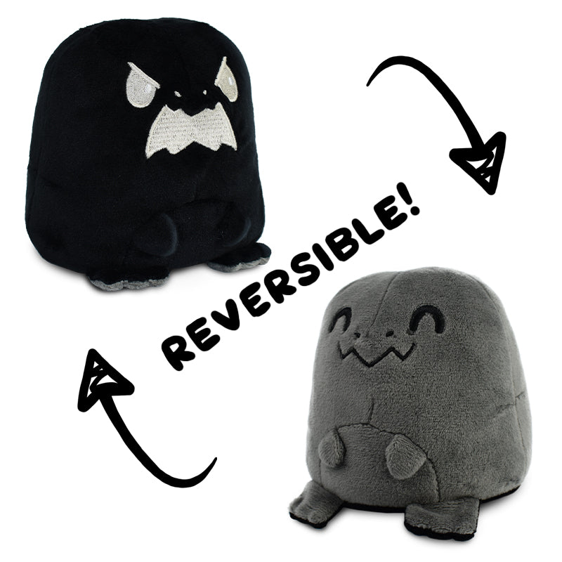 Explore a world of endless fun and expressions with our TeeTurtle Reversible T-Rex Plushie (Black + Gray). These mood plushies from TeeTurtle are the perfect companions, offering an incredible reversible feature that allows you to switch between