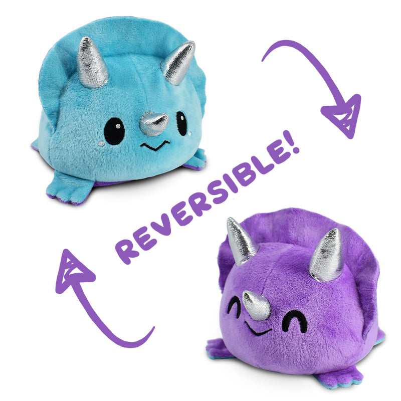 This TeeTurtle Reversible Triceratops Plushie (Blue + Purple) combines the calming colors of blue and purple into a delightful mood plushie.
