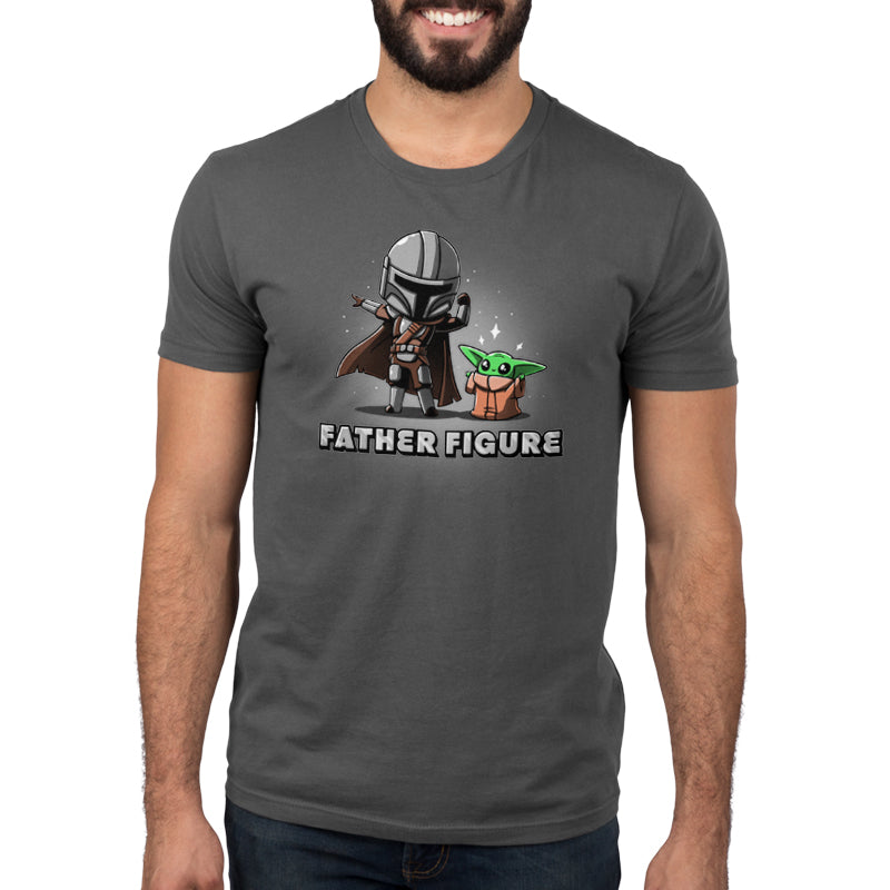 A man wearing a t-shirt with the words Father Figure (Mando & Grogu) by Star Wars on it.
