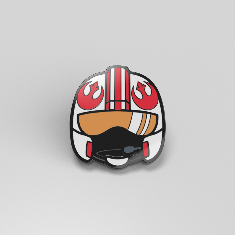 An officially licensed Star Wars Rebel Pilot Helmet Pin on a white surface.