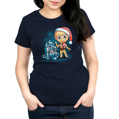 An officially licensed Festive R2-D2 and C-3PO women's T-shirt featuring an image of a gingerbread man in a Santa hat.