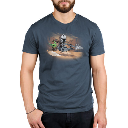 A man wearing an officially licensed Star Wars Grogu & Mando Desert Speeder t-shirt.