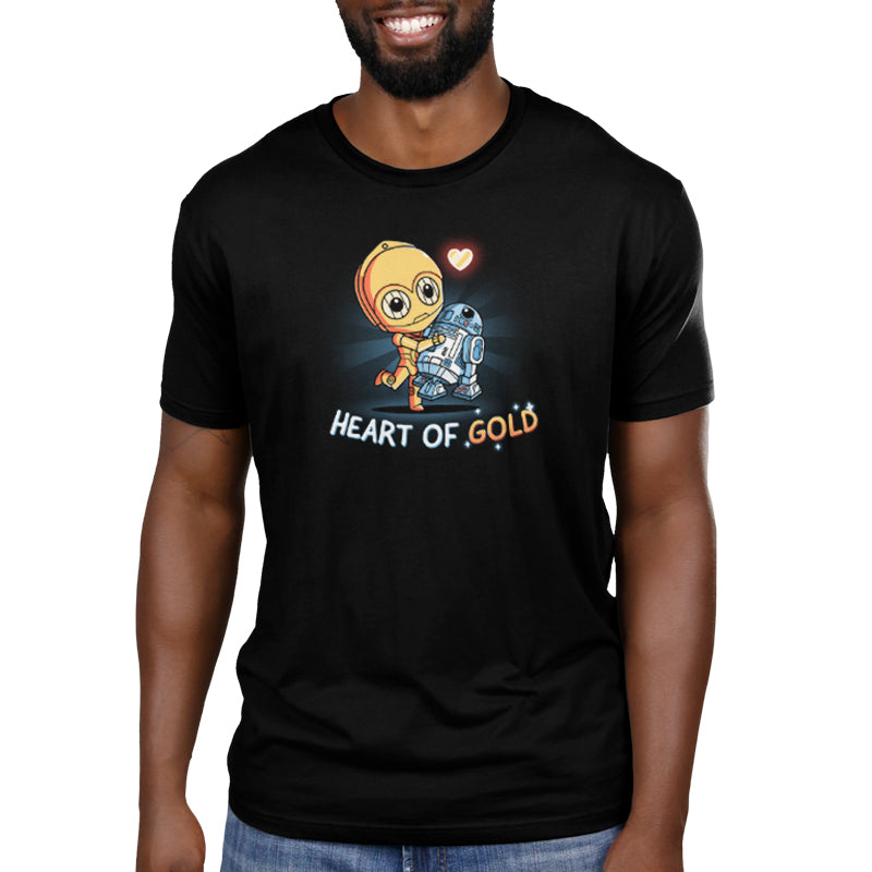 A man wearing a black t-shirt with Star Wars Heart of Gold merchandise.