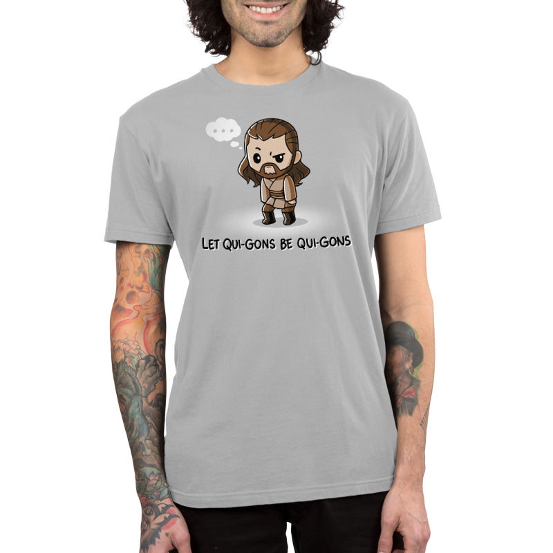 A man wearing a Let Qui-Gons be Qui-Gons T-shirt made of Super Soft Ringspun Cotton.