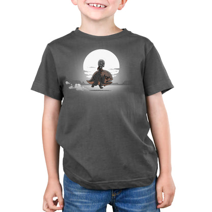 A young boy wearing an officially licensed Star Wars Mandalorian t-shirt.