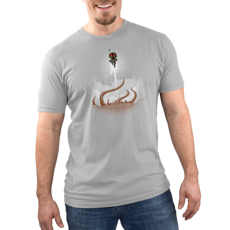 A man wearing an officially licensed Star Wars grey t-shirt with an image of The Sarlacc Pit.
