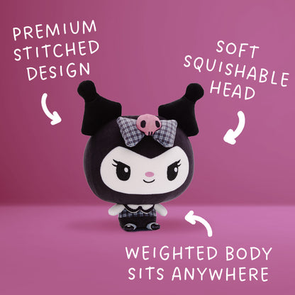 A Kuromi Cloudheads plushie toy with black hair and ears, a white face, a pink skull accent on a plaid bow, and a plaid outfit with a fancy collar on her tiny body, shown on a pink background with the text "premium stitched design," "soft squishable head," and "weighted body sits anywhere." 