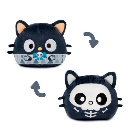 chococat reversible flush one side is him wearing an argyle sweater with his skull bowtie and the other side. He is a full skeleton.