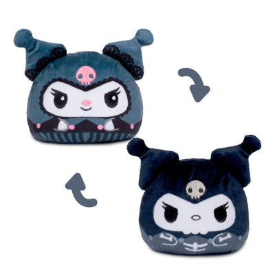 Kuromi reversible plush. The plush is dark blue-gray with a white face, black details, and a small pink skull on its hat.