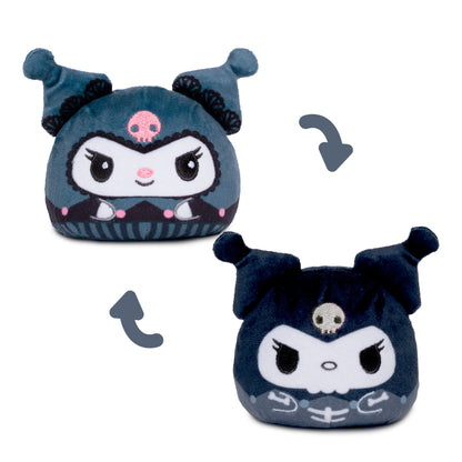 Kuromi reversible plush. The plush is dark blue-gray with a white face, black details, and a small pink skull on its hat.
