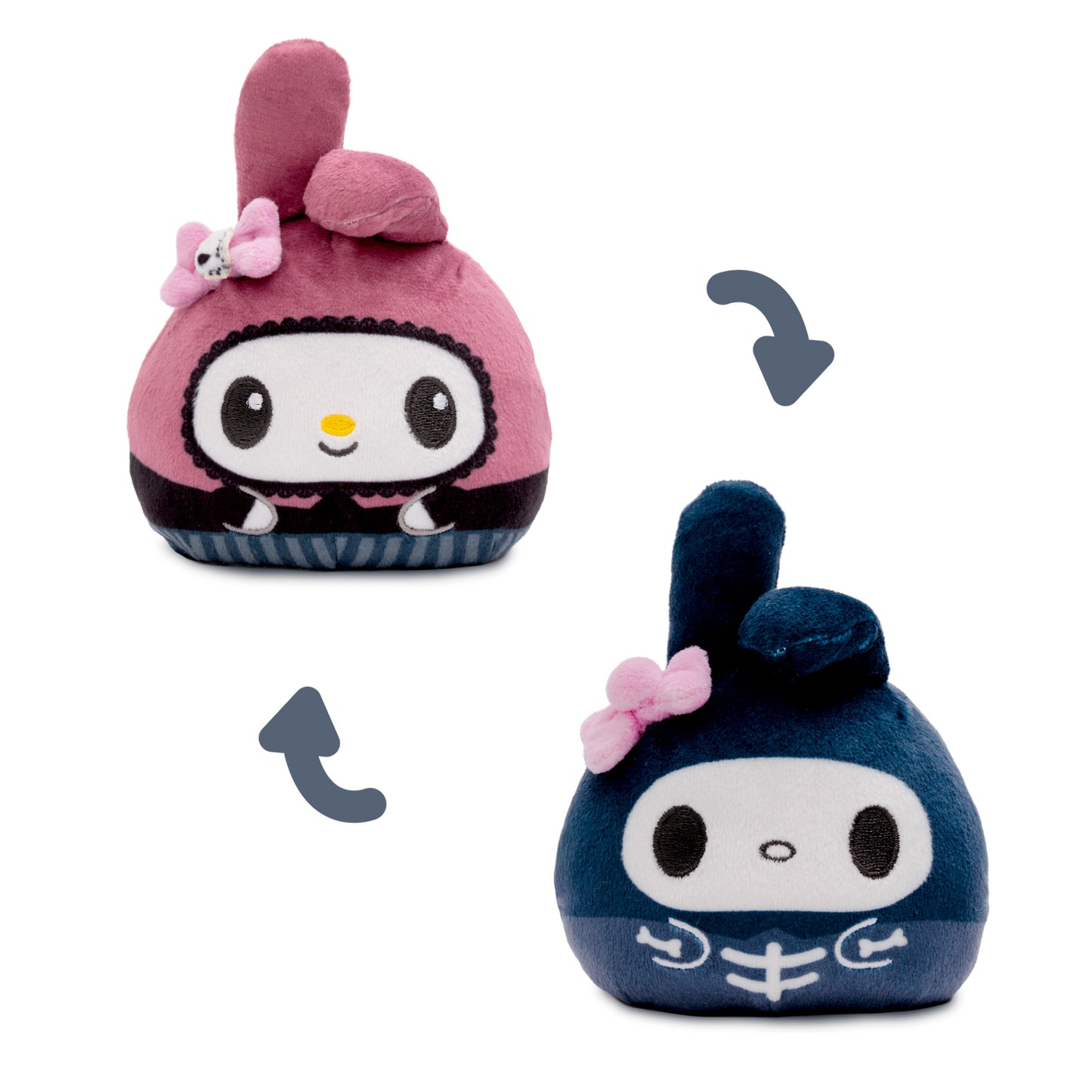 My melody reversible plush one side with a cute skeleton bow and a striped dress, the other side dressed as a skeleton