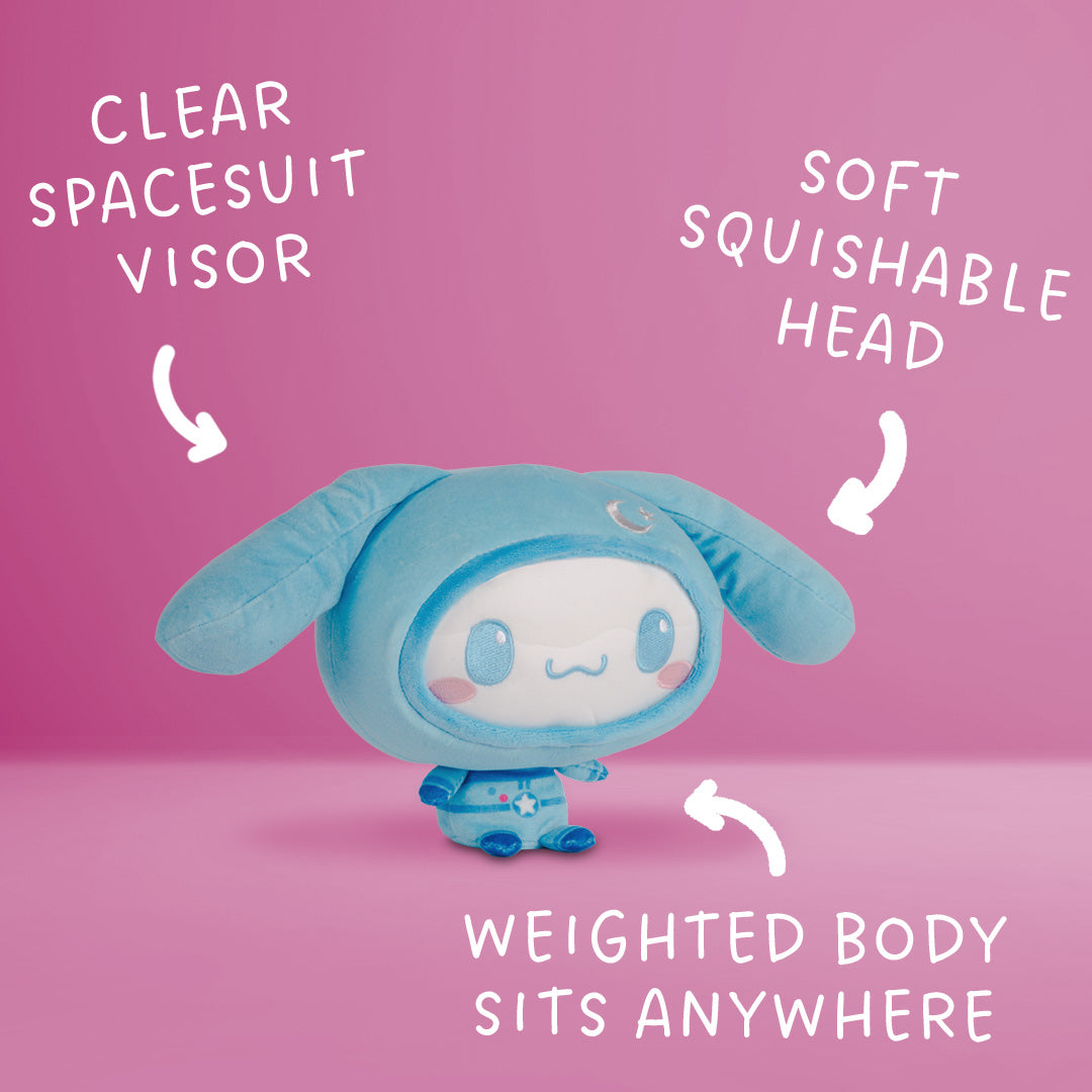 Blue Cinnamoroll plush sitting upright with long floppy ears, a white face, pink cheeks, and a blue outfit.