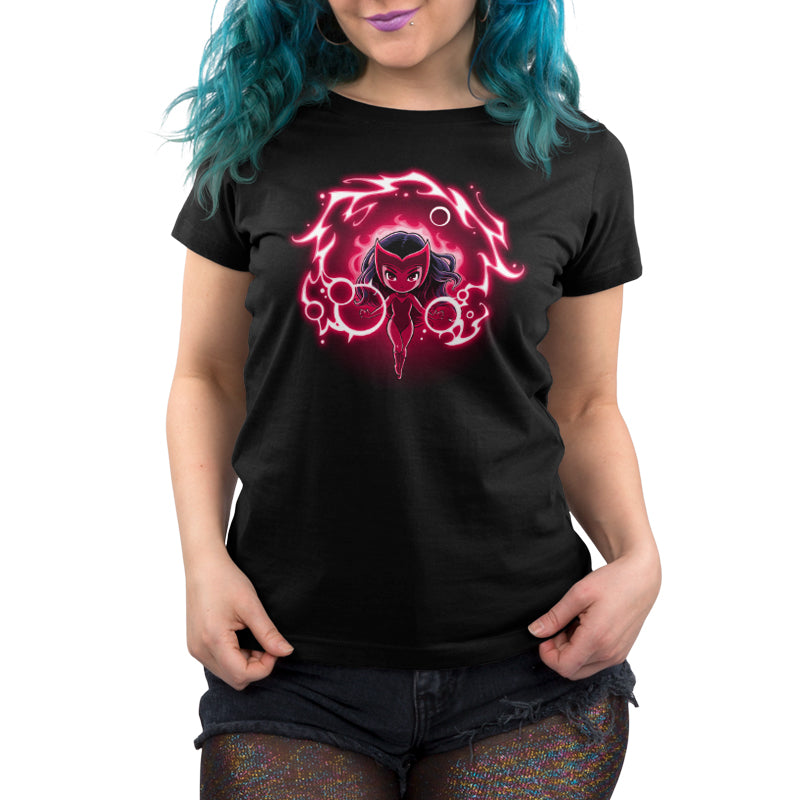 A woman wearing a black t-shirt with an image of a pink skull showcasing her Scarlet Witch vibe in Marvel.