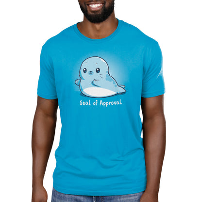 A man wearing a cobalt blue t-shirt with the TeeTurtle Seal of Approval.
