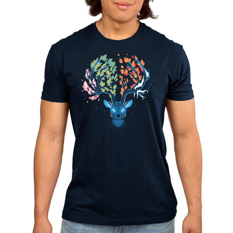 Premium Cotton T-shirt_Teeturtle Seasonal Stag Navy Blue Featuring a stylized stag with glowing eyes and the tines of its horns covered in leaves of various colors as well as frost, representing each of nature's four seasons.