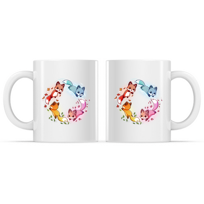 Ceramic Mug_TeeTurtle Seasonal Foxes Mug white mug featuring four adorable foxes representing the seasons arranged in a circle, with autumn leaves, winter snow, spring blossoms, and summer greenery trailing behind them.