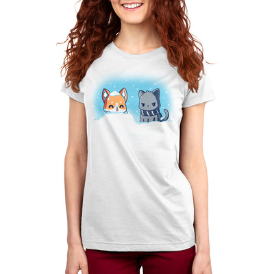 Premium Cotton T-shirt_Teeturtle white Snow Pals apparel featuring a happy puppy poking its head out of the snow with its tongue sticking out while an unamused cat in a scarf looks on.