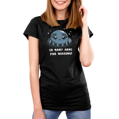 A woman wearing a black t-shirt with a TeeTurtle Spider Hugs design.