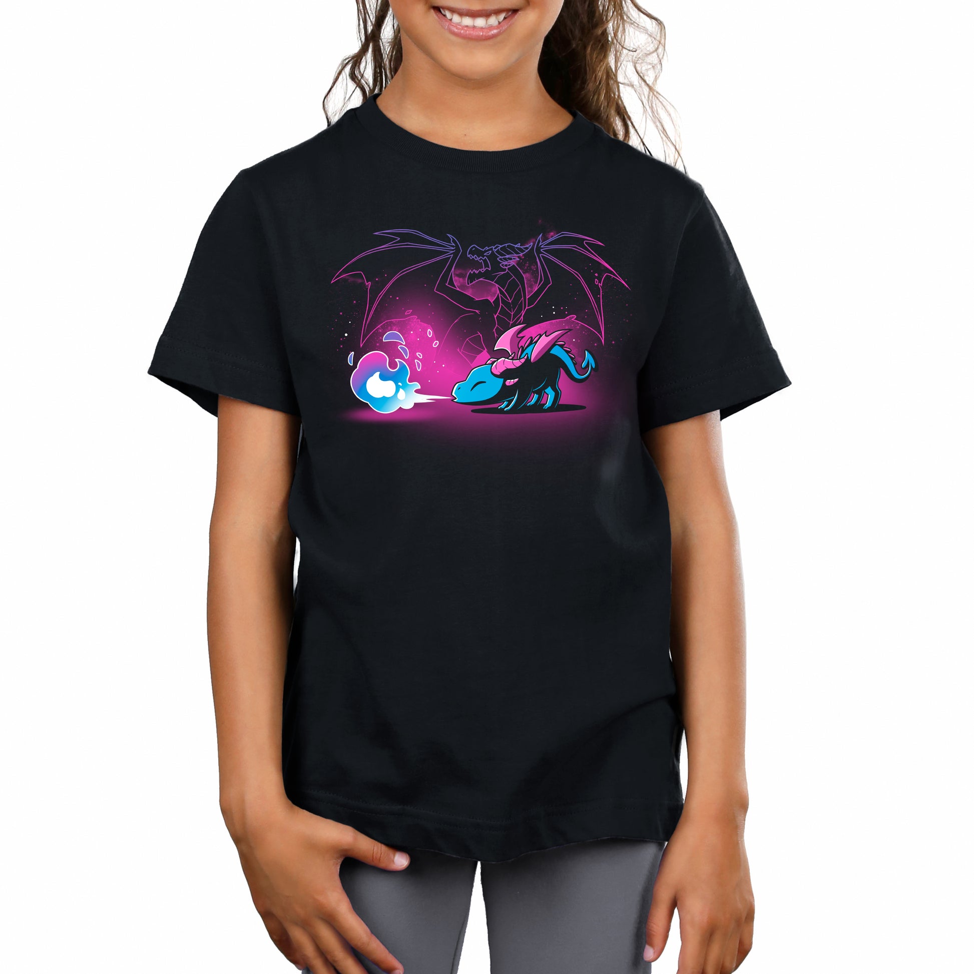 A girl with aspirations wearing a black t-shirt with the Spirit of the Dragon from TeeTurtle at campfire night.