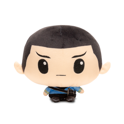 Front view of a Spock plush with short black hair, pointed Vulcan ears, a blue Starfleet uniform, and a small weighted body.