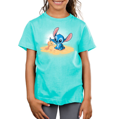 Officially licensed Disney Stitch's Snowman t-shirt featuring a girl wearing a turquoise t-shirt with an image of Stitch and Lilo.