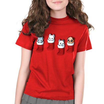 Premium Cotton T-shirt_TeeTurtle Stocking Stuffers red t-shirt featuring a group of three cats and pug puppy looking cute in Christmas stockings.
