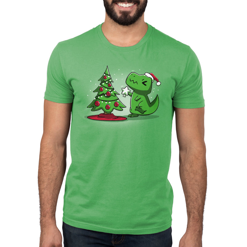 A man wearing an apple green t-shirt with a TeeTurtle Christmas T-Rex and a Christmas tree.