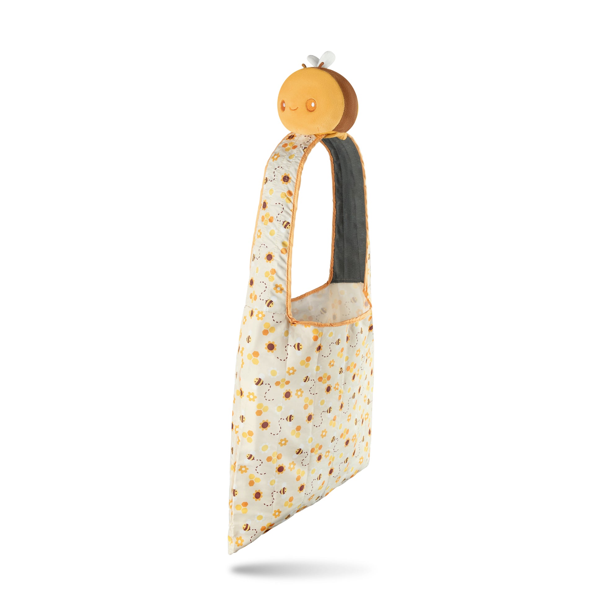 A Plushiverse Honeybee Plushie Tote Bag by TeeTurtle, with orange polka dots on a white background.
