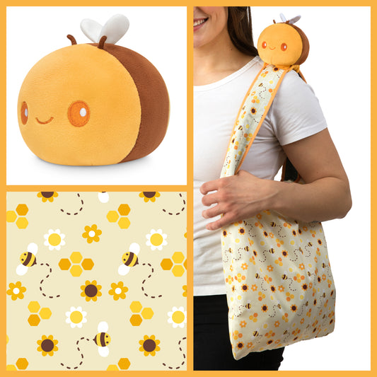 A woman is holding a Plushiverse Honeybee Plushie Tote Bag from TeeTurtle, showcasing her love for TeeTurtle plushies.