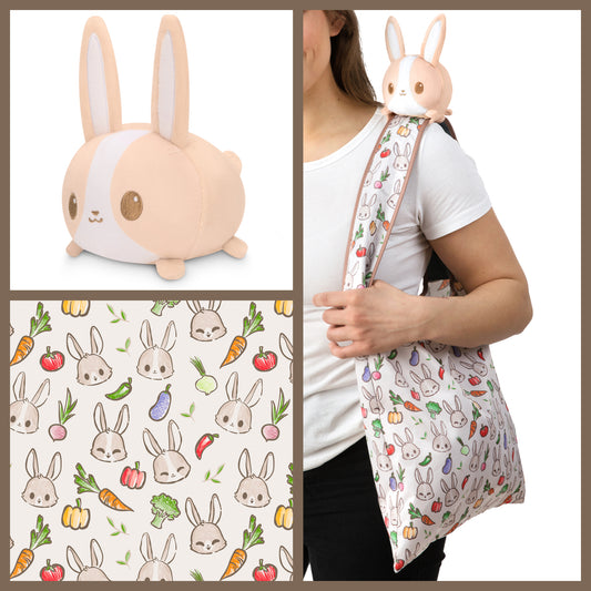 A woman is holding a TeeTurtle Plushiverse Farmer's Market Bunny Plushie Tote Bag.