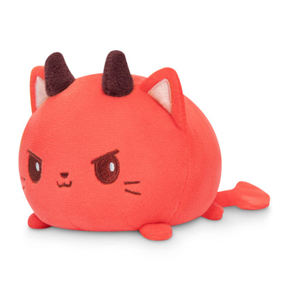 A red Plushiverse Devilish Kitty Plushie Tote Bag with a face. (Brand Name: TeeTurtle)