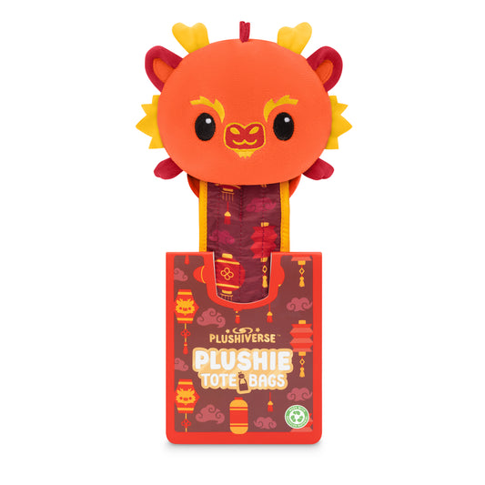 A Plushiverse Lunar New Year Dragon Plushie Tote Bag by TeeTurtle, perfect for celebrating the Lunar New Year, tucked inside a box.
