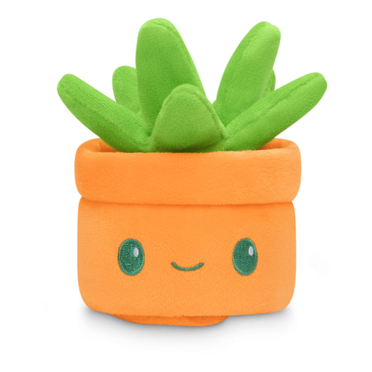 A Plushiverse Succulent Garden Plushie Tote Bag, perfect for any TeeTurtle plushies collector. This adorable plushie friend features green leaves and comes in a pot. Don't forget to check inside the secret tote.