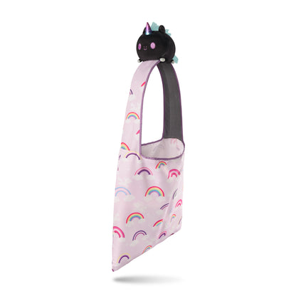 A Plushiverse Rainbow Pride Unicorn Plushie Tote Bag by TeeTurtle, perfect for storing plushies.