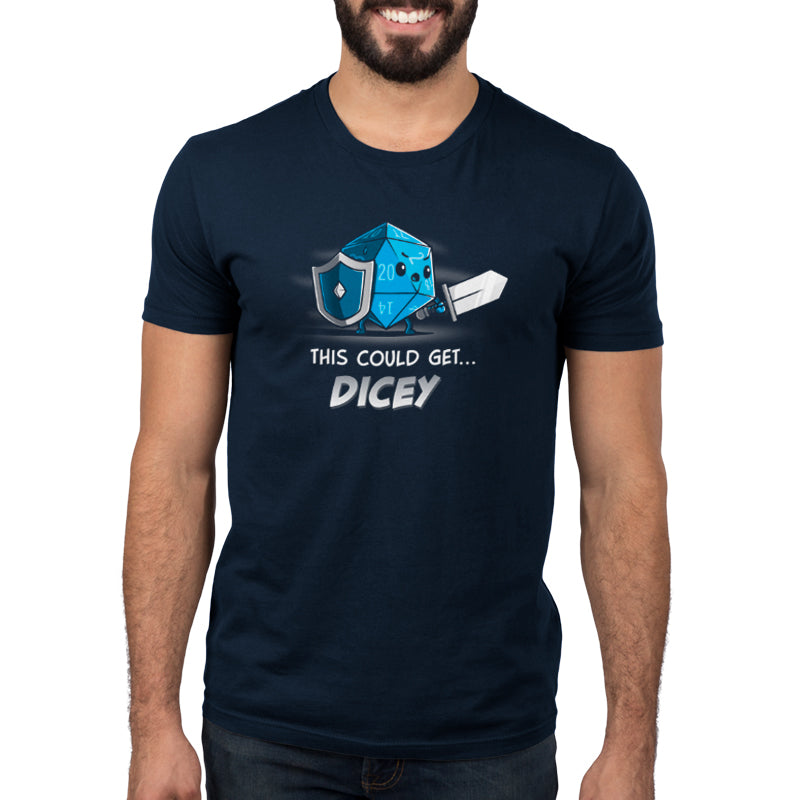 A man wearing a navy blue t-shirt with the brand name TeeTurtle and the product name This Could Get Dicey written on it.