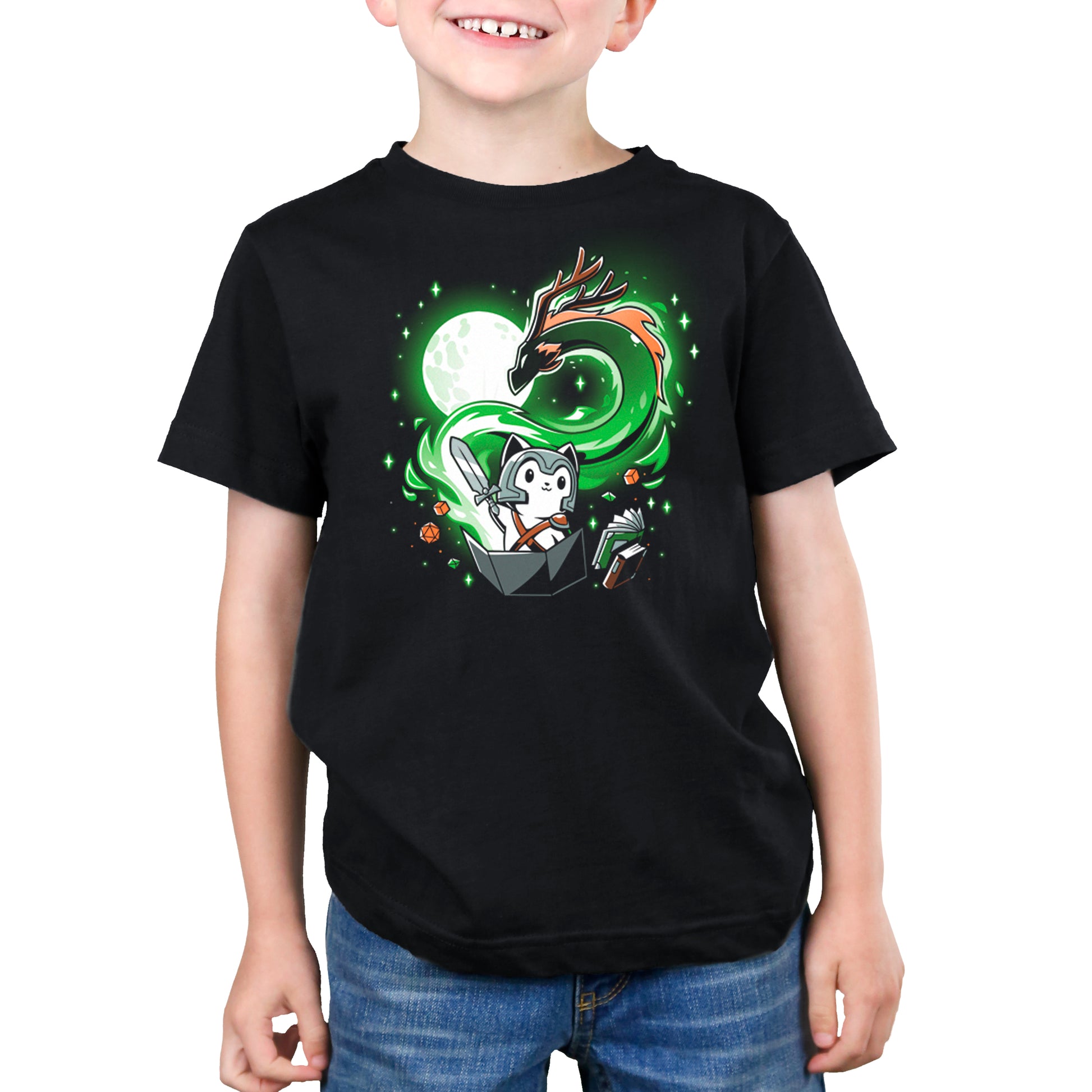 A young boy donning a TeeTurtle A Tale of Adventure black t-shirt featuring a green dragon, embarking on a role-playing adventure.