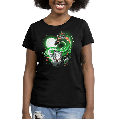 A woman wearing a TeeTurtle "A Tale of Adventure" black t-shirt featuring an image of a cat and a moon, embarking on a role-playing adventure.