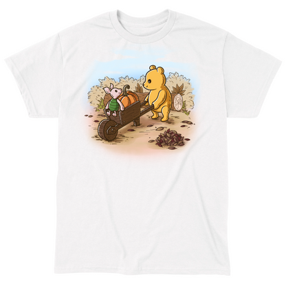 Classic Cotton T-shirt_TeeTurtle white A Perfect Autumn Day Classic Cotton T-shirt featuring a bear pulling a wagon filled with pumpkins while a little mouse rides along, surrounded by autumn bushes, fallen leaves, and tree stumps on a crisp fall day.