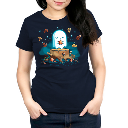 Premium Cotton T-shirt_TeeTurtle navy Autumn Apparition Premium Cotton T-shirt featuring a glowing ghost peacefully holding a pumpkin while floating above a tree stump surrounded by mushrooms, wildflowers, falling autumn leaves, and twinkling stars in a whimsical nighttime forest.