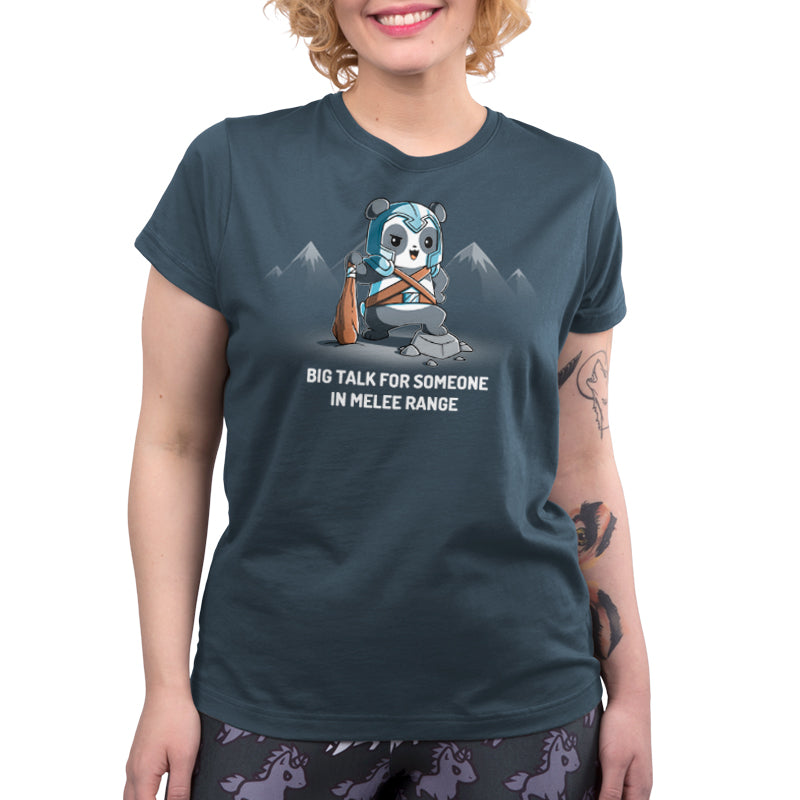 A woman wearing a TeeTurtle women's t-shirt with a panda on it.