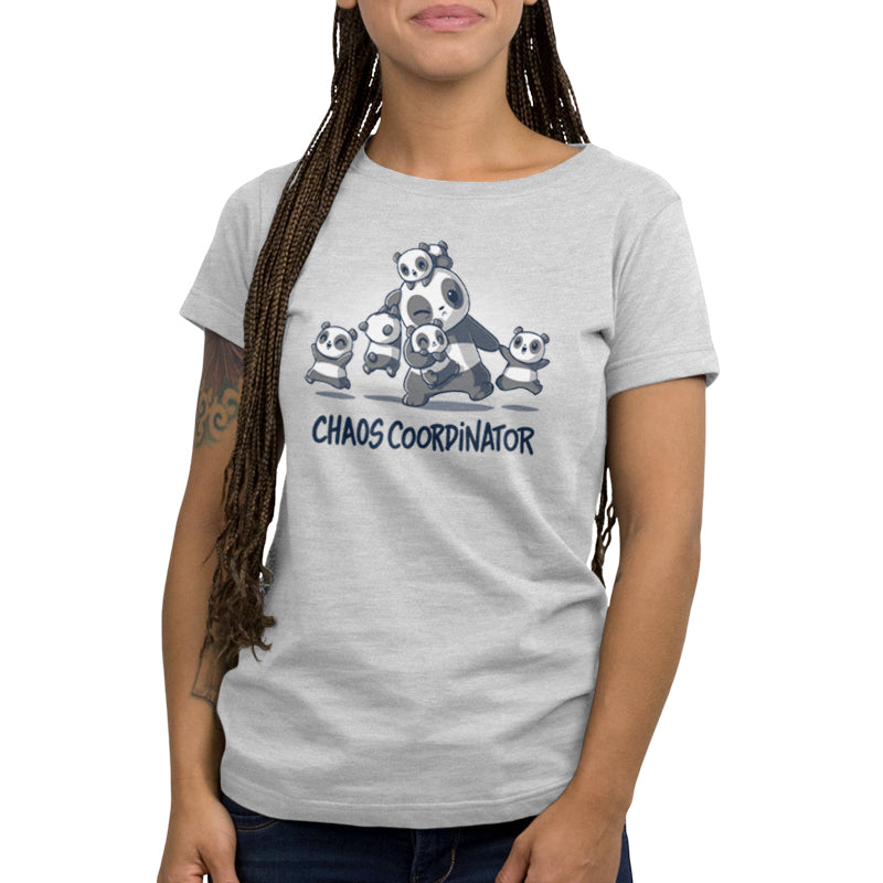A woman wearing a TeeTurtle Chaos Coordinator women's t-shirt that says cmc panda.