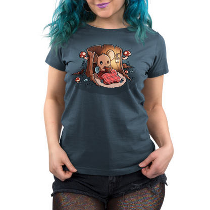 Premium Cotton T-shirt_TeeTurtle heathered blue Cozy Reading Nook Premium Cotton T-shirt featuring a cozy little mouse reading a book under a red plaid blanket inside a hollow tree stump illuminated by a hanging lantern and surrounded by mushrooms.