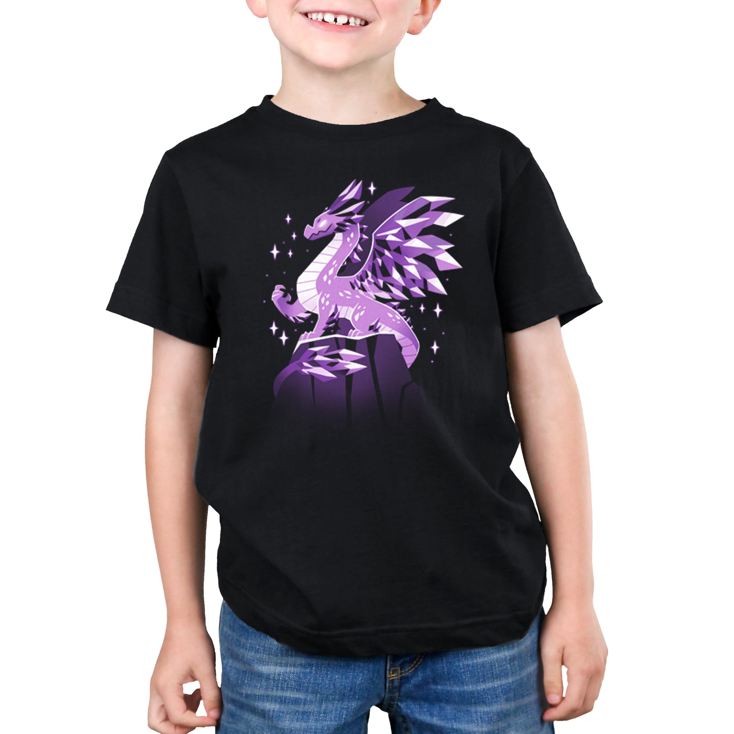 A young boy wearing a black t-shirt with a TeeTurtle Crystal Dragon on it and holding crystals.