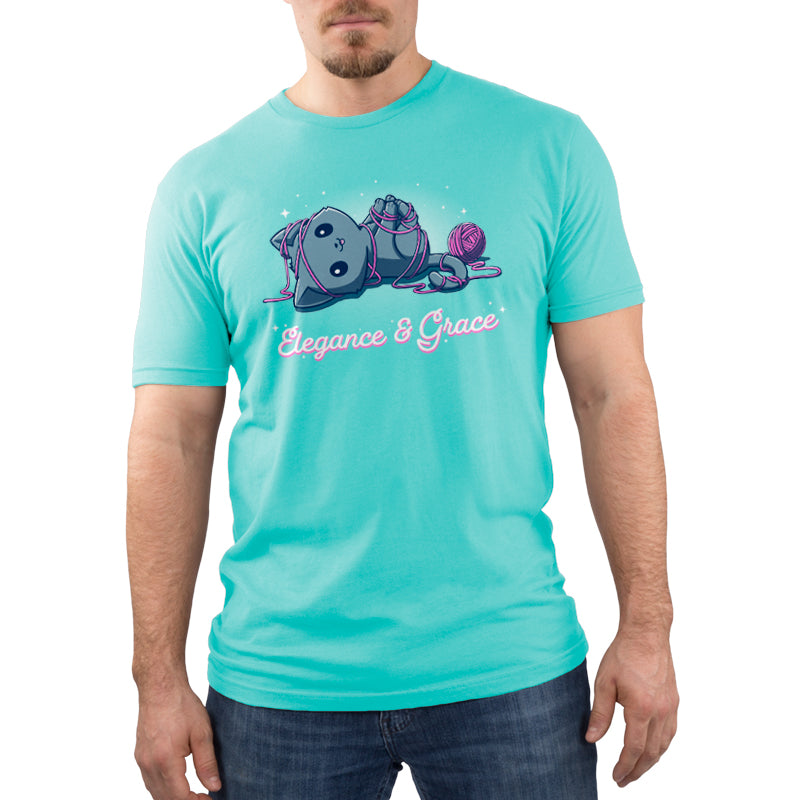 A man wearing a Caribbean blue Elegance and Grace t-shirt with a TeeTurtle cat design.