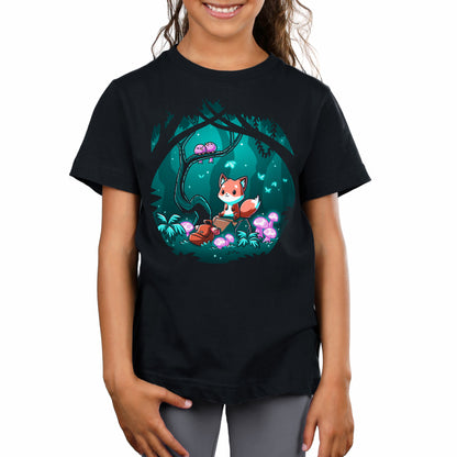 A girl wearing a black TeeTurtle Enchanted Forest t-shirt with an image of a fox in the enchanted forest.